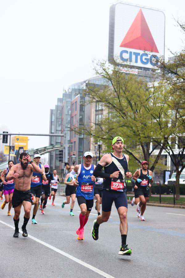 Chris runs in front of the iconic Citgo sign