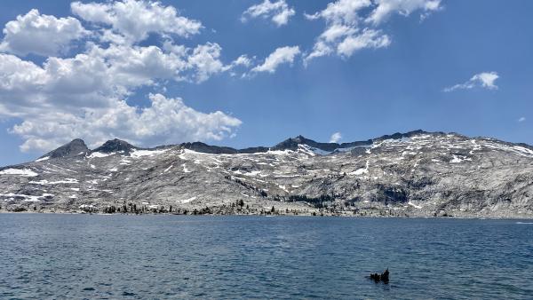 A photo of Pyramid, Agassiz, and Price towering over Lake Aloha