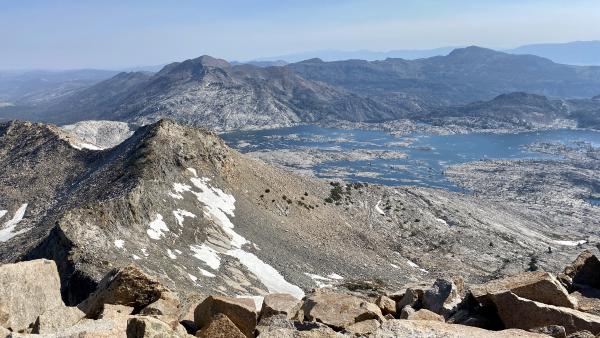 A view from the summit of Pyramid Peak, with Agassiz and Price in the foreground and Lake Aloha in the distance