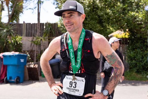 Chris looks exhausted at the finish line